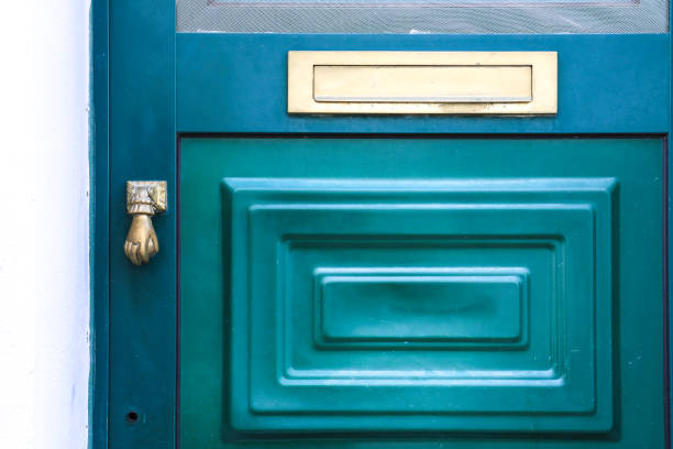 istock Typical Portuguese facade with colorful green door 1487477840