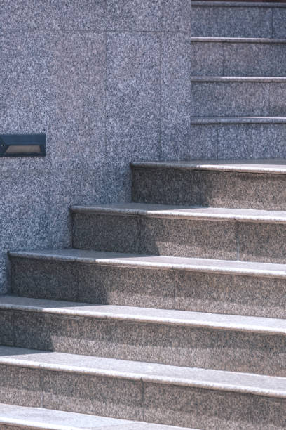 istock Gray marble staircase in entrance building area and vertical frame 1487484844