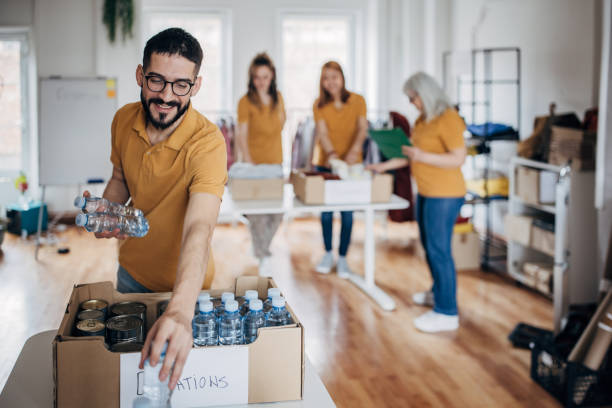 istock Man working in charity donation center 1487485497