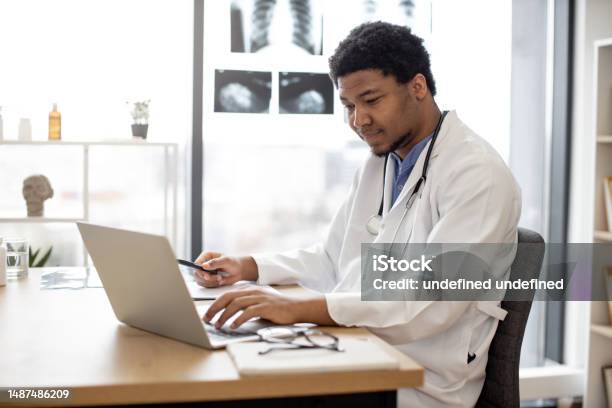Pro At Using Computers Professional Using Computer In Doctors Workplace In Clinic Stock Photo ...