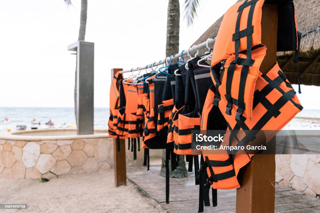 Travel lifestyle Life jacket orange ready to be used by tourist going on a boat trip Adventure Stock Photo
