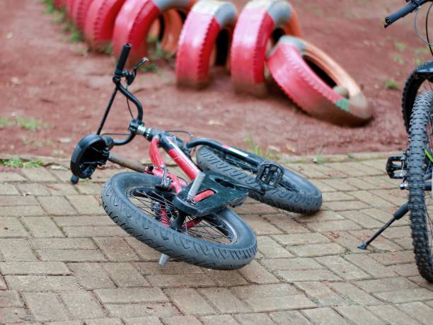 istock bicycle lying on the road 1487497820