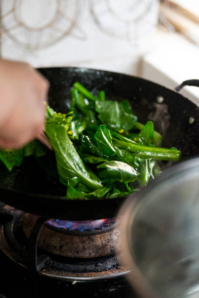 istock Stir-fried vegetables in the Chinese family kitchen 1487499945