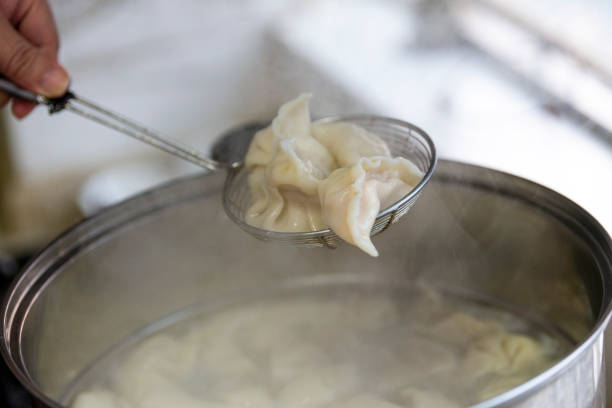 istock A pot of cooking dumplings 1487500080