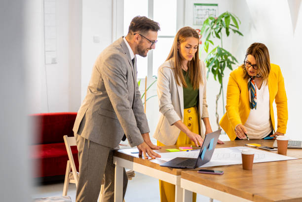 istock Group of business people working in office. 1487500187