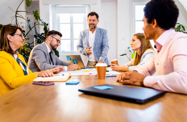 istock Group of business people working in office. 1487500287