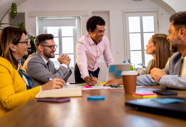 istock Group of business people working in office. 1487500363