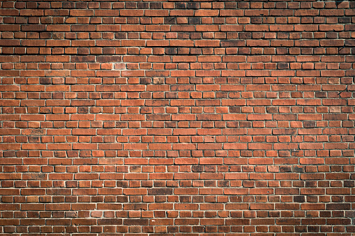 Old panorama vintage red brick wall for background and texture.