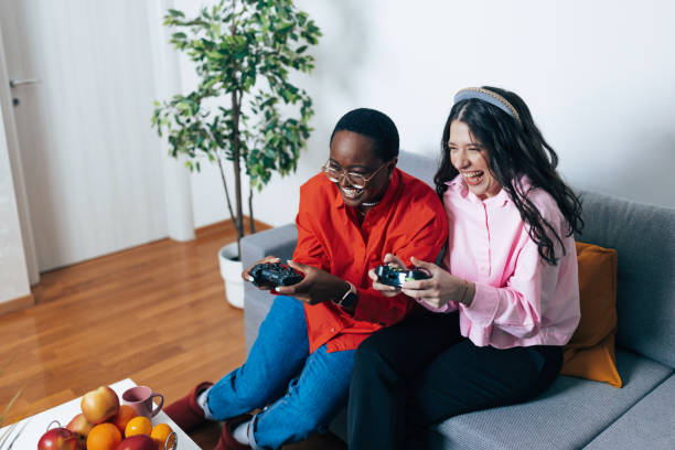 istock Friends laughing and gaming 1487505490