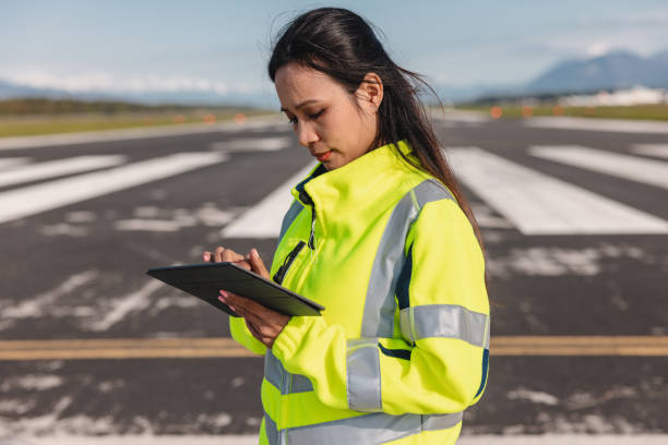 istock A Female Aircraft Engineer Checking Her Digital Tablet 1487505749