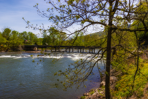Landscape view of the Tuckasegee River in the town of Dillsboro, North Carolina.