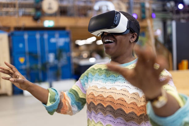 Creative professional testing new vr glasses at makers space stock photo