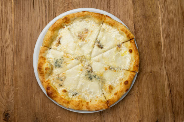delicious italian pizza on a wooden table