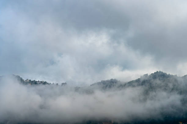 istock Clouds over the hilltops near Como, Italy. 1487515890