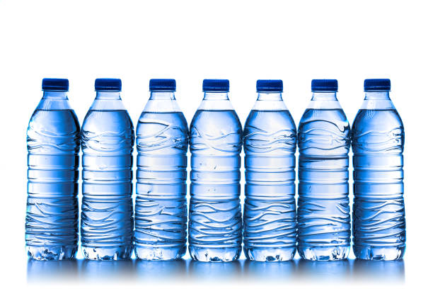 istock pile of half litre plastic water bottles with blue cap 1487517265