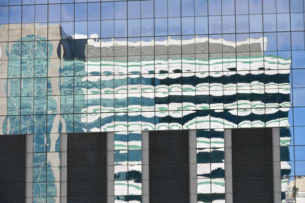 istock Modern Business Office Buildings Reflecting 1487517408