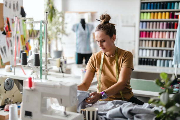 istock Young fashion designer working at her workplace 1487522385