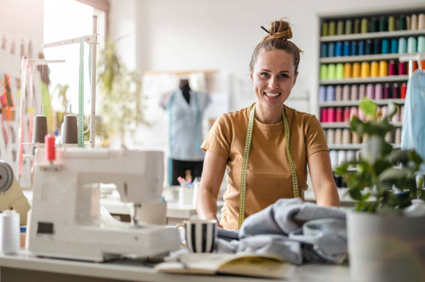 istock Young fashion designer at her workplace 1487522387