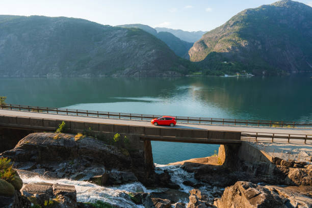 Car on bridge across the river in Norway