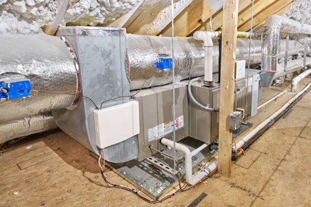 istock Attic gas furnace, pipes and ductwork 1487523577
