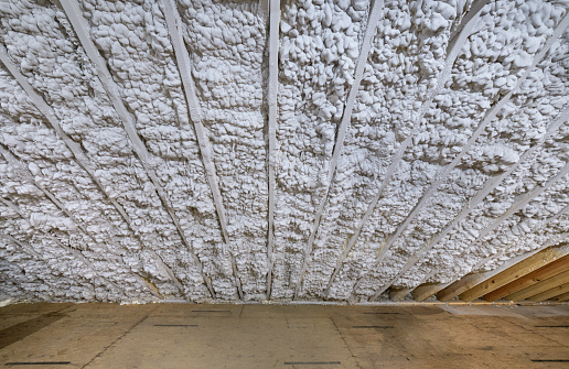 Closed cell foam insulation in an unfinished attic