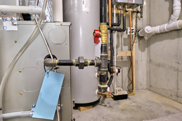 istock Furnace gas line in basement mechanical room 1487523936