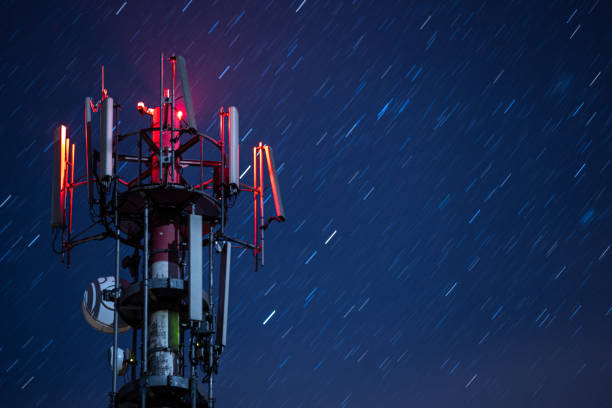 Telecommunication towers with 5G cellular network antennas Telecommunication towers with 5G cellular network antennas on nature background, big digital data concept telecommunications equipment stock pictures, royalty-free photos & images