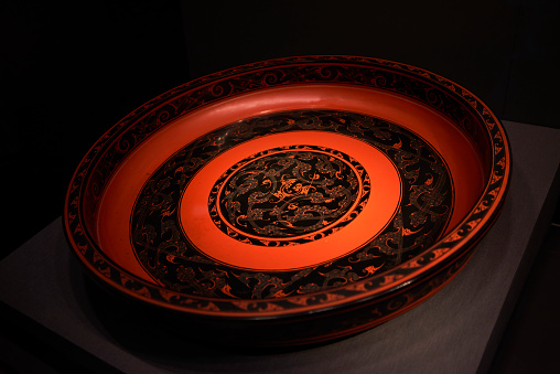 Exquisite red and black lacquerware round dinner plate