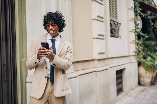 istock Businessman talking on the mobile phone while commuting in the city 1487530639
