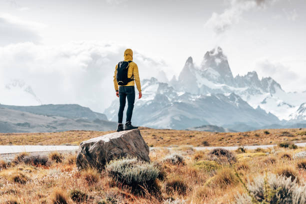 istock man resting on the rock in el chalten 1487532154