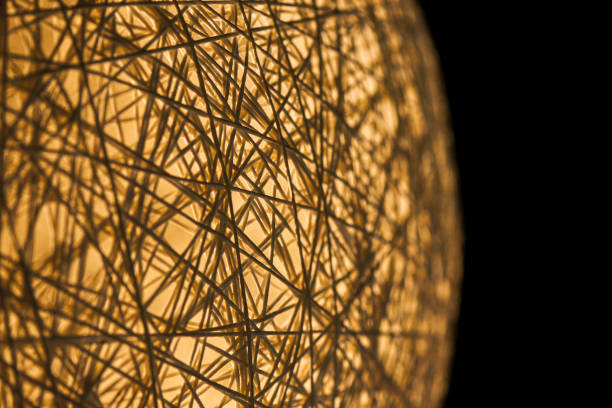 The surface of a glowing sphere with abstract crisscross lines