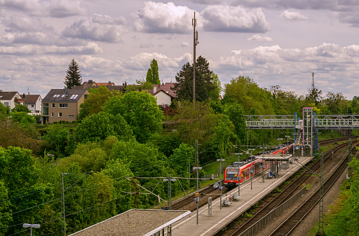 STUTTGART,GERMANY - APRIL 03,2020:Oesterfeld This is a small train station near the border to Vaihingen..The bridge leads to a business complex.