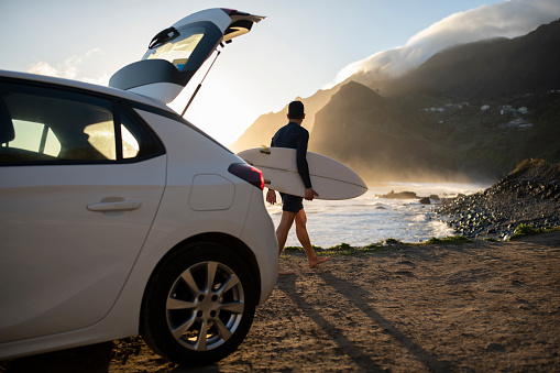 Surfer ready to catch the ocean waves.