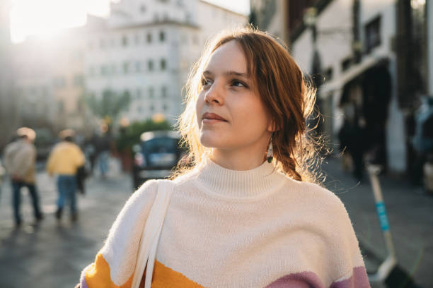 istock A woman is exploring the city at sunset 1487545702