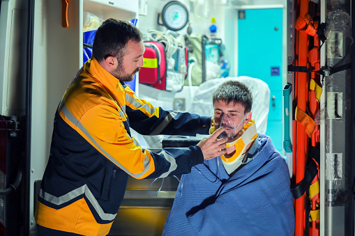 Ambulance and Health Worker, Oxygen Mask, First Aid Response, Emergency Service, Health Care Worker and Emergency Response, Shortness of Breath, Oxygen Mask and Neck Collar, 911 Team