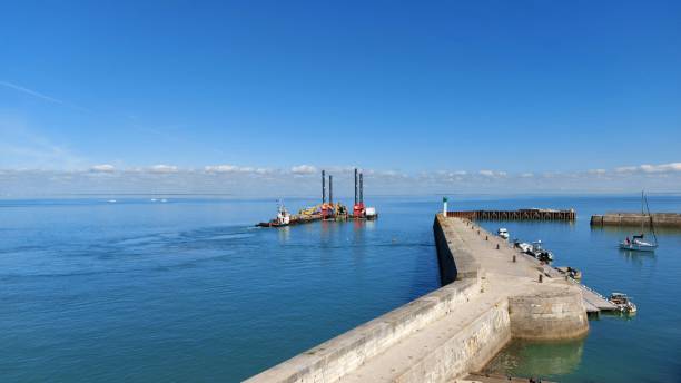 istock entrance of the harbour 1487547860