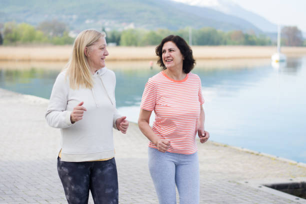 istock jogging on the lake coast in the morning 1487550172
