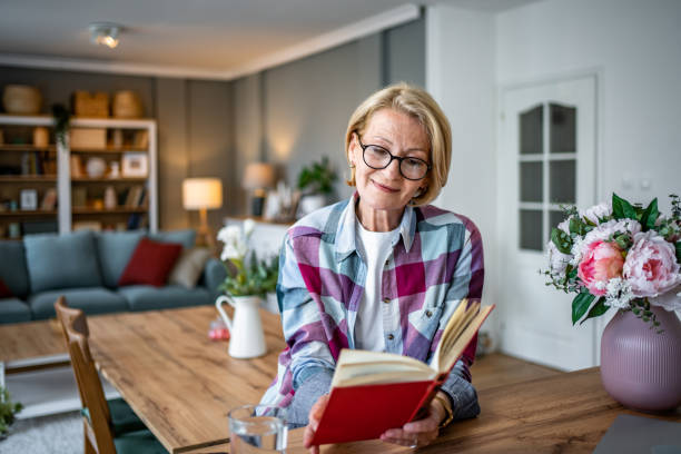 istock Morning bliss, I love this quiet moment with a good book 1487551392