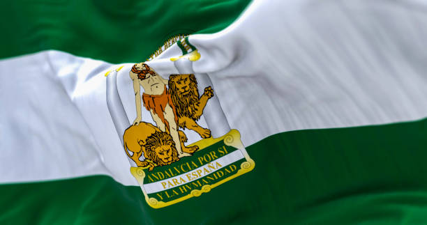 istock The Andalusia flag waving in the wind 1487554155