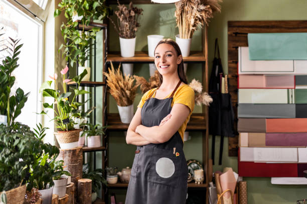 istock Female owner with arms crossed looking at camera 1487559184