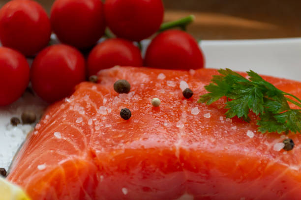 istock A large piece of salmon with tomatoes and spices 1487561018