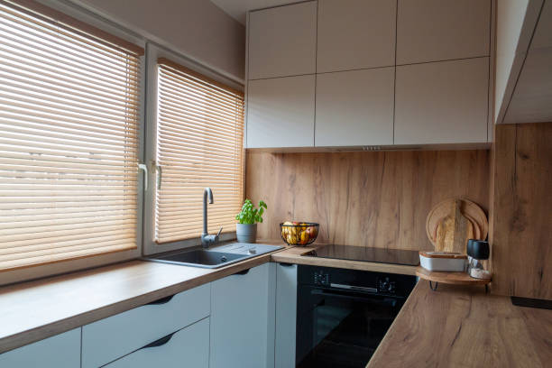 istock Small cozy wood modern kitchen with wooden shutters 1487565749