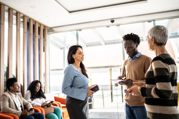 istock Business coworkers talking or office lobby 1487569891