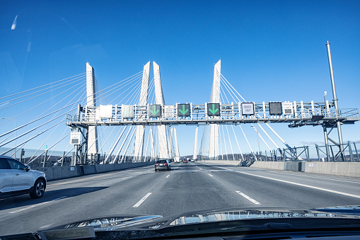 Car driver point of view on March 8, 2023 traveling on the westbound Governor Mario M. Cuomo Bridge crossing the Hudson River in southern New York State between the village of Tarrytown and the hamlet of South Nyack in Westchester and Rockland counties.