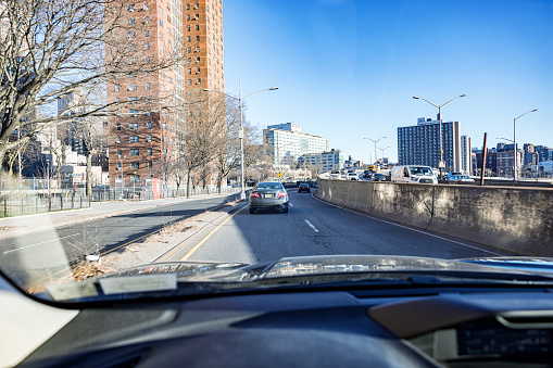 Car driver's point of view driving in morning traffic on the FDR Drive in Manhattan, New York City, on March 8, 2023.