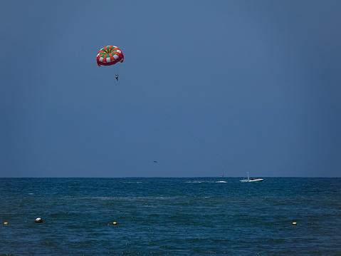 Nuevo Vallarta, Nayarit, Mexico-April 19, 2023:Parasailing over the sea. Neuvo Vallarta, Mexico.