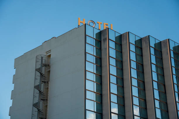 istock Modern building - hotel with clouds reflecting in it`s windows 1487572777