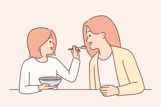 Vector illustration of Little girl feeds mother with spoon during breakfast sitting at kitchen table spending time together