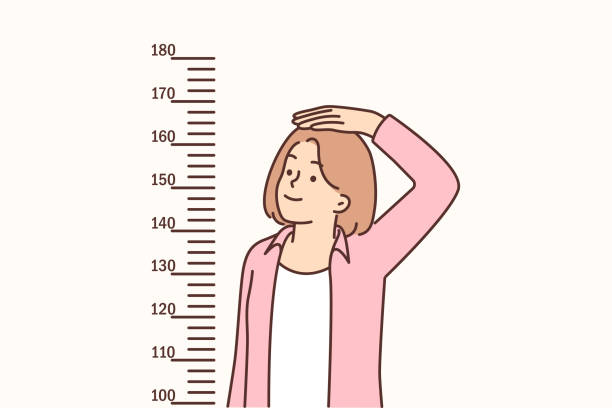 illustrations, cliparts, dessins animés et icônes de une adolescente mesure la taille debout près des marques sur le mur, voulant devenir grande - tall human height women measuring