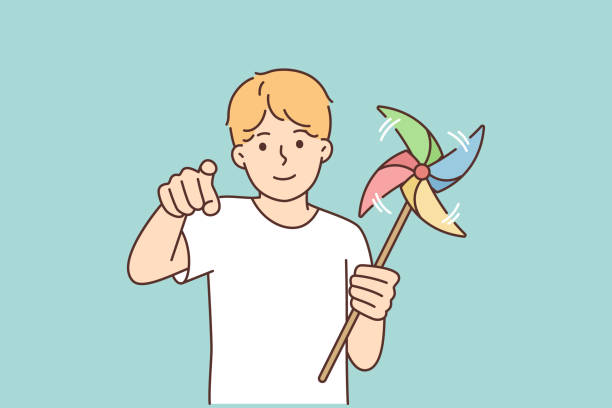 ilustrações de stock, clip art, desenhos animados e ícones de little boy with pinwheel points finger at screen, urging to go for walk and play together - rainbow preschooler baby child